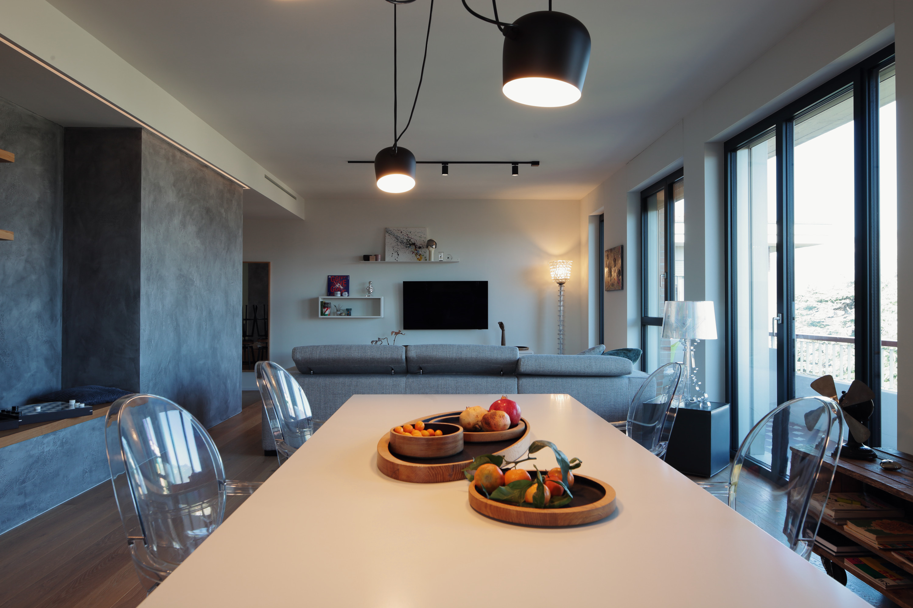 Casa EA, living e volume centrale con arredi su misura